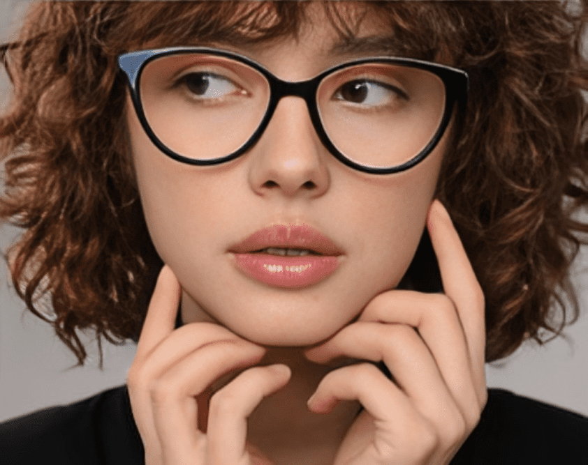 Kids wearing round eyeglasses with brown and beige tortoiseshell frames