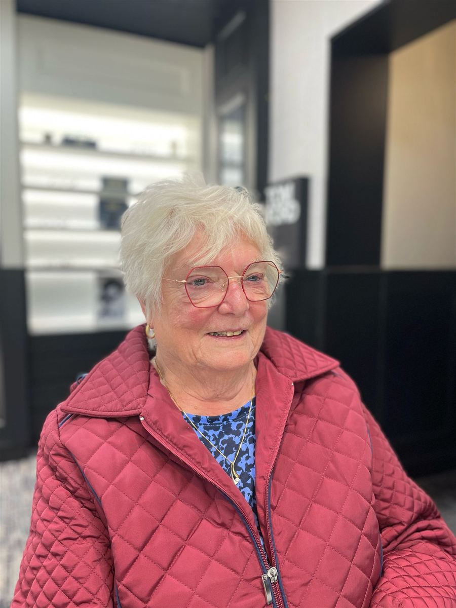 One of our patients in their new glasses, chosen at Abra & Co