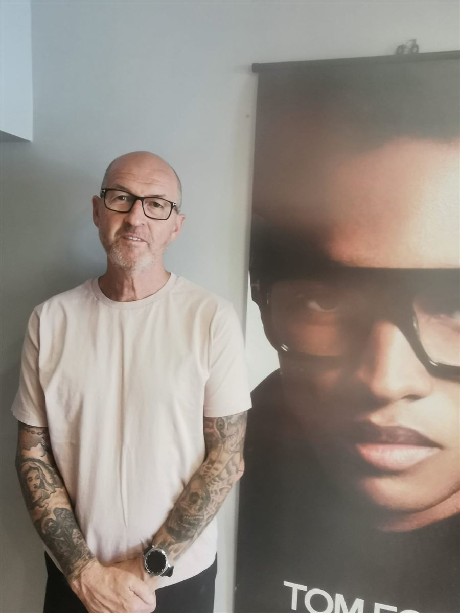 One of our patients in their new glasses, chosen at Abra & Co