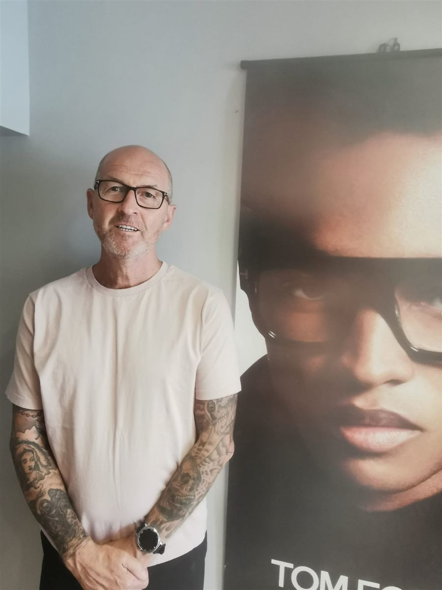 One of our patients in their new glasses, chosen at Abra & Co