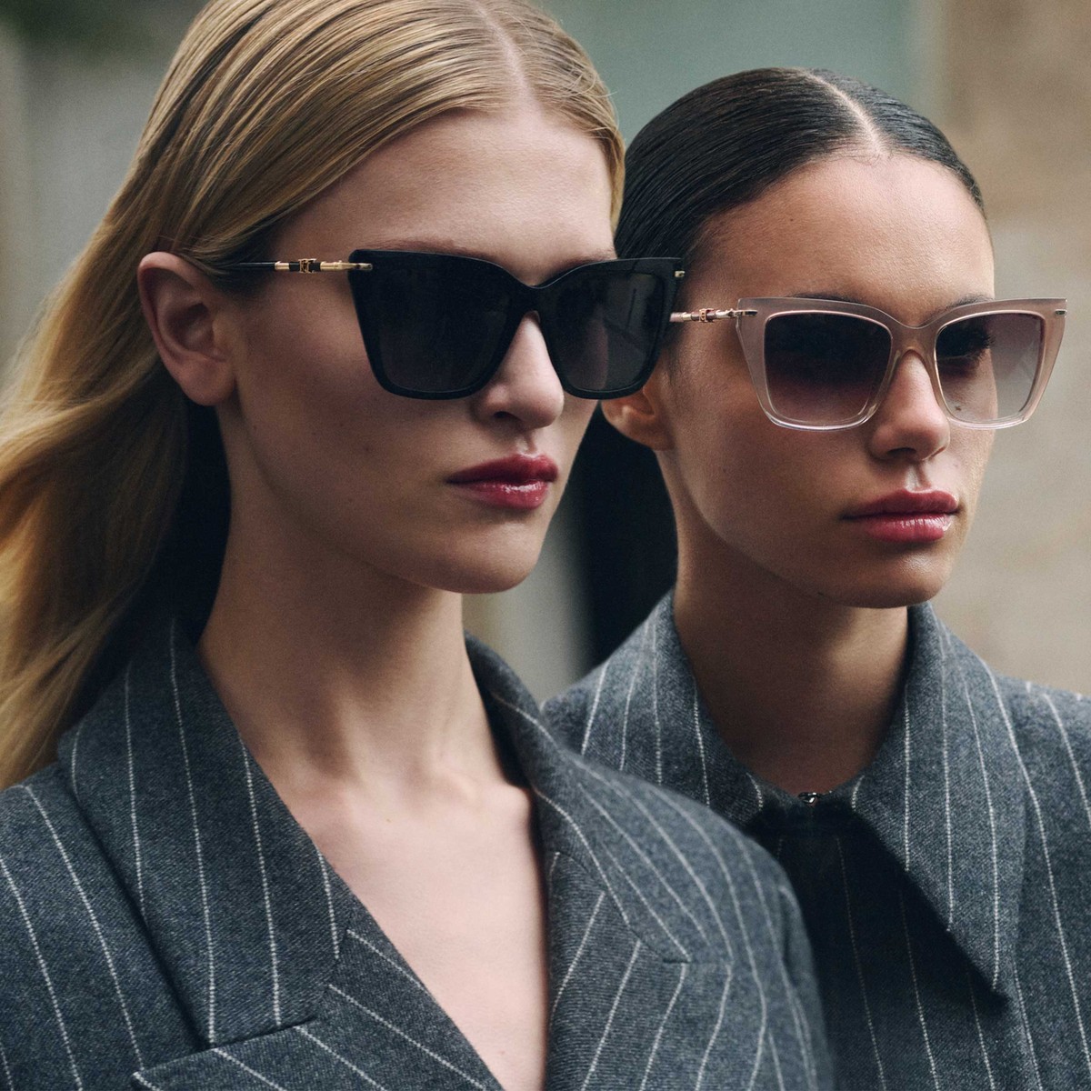 Two models in Carolina Herrera sunglasses