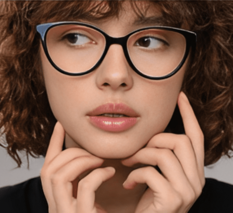 Kids wearing round eyeglasses with brown and beige tortoiseshell frames